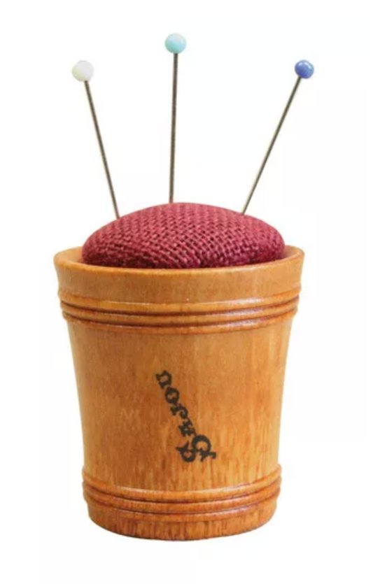 Wooden pin cushion with bordeaux linen